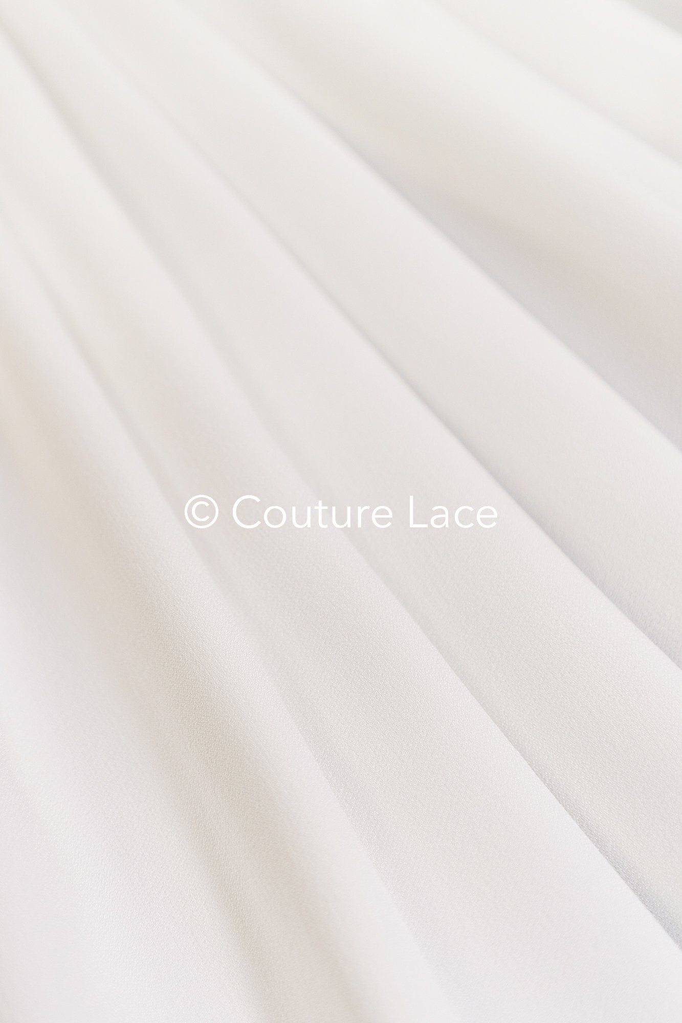 Heavy off-white stretch crepe fabric for wedding dresses – High-quality elastic fabric for creative wedding designs | Ideal for bridal wear & customization // R-195 (copy)
