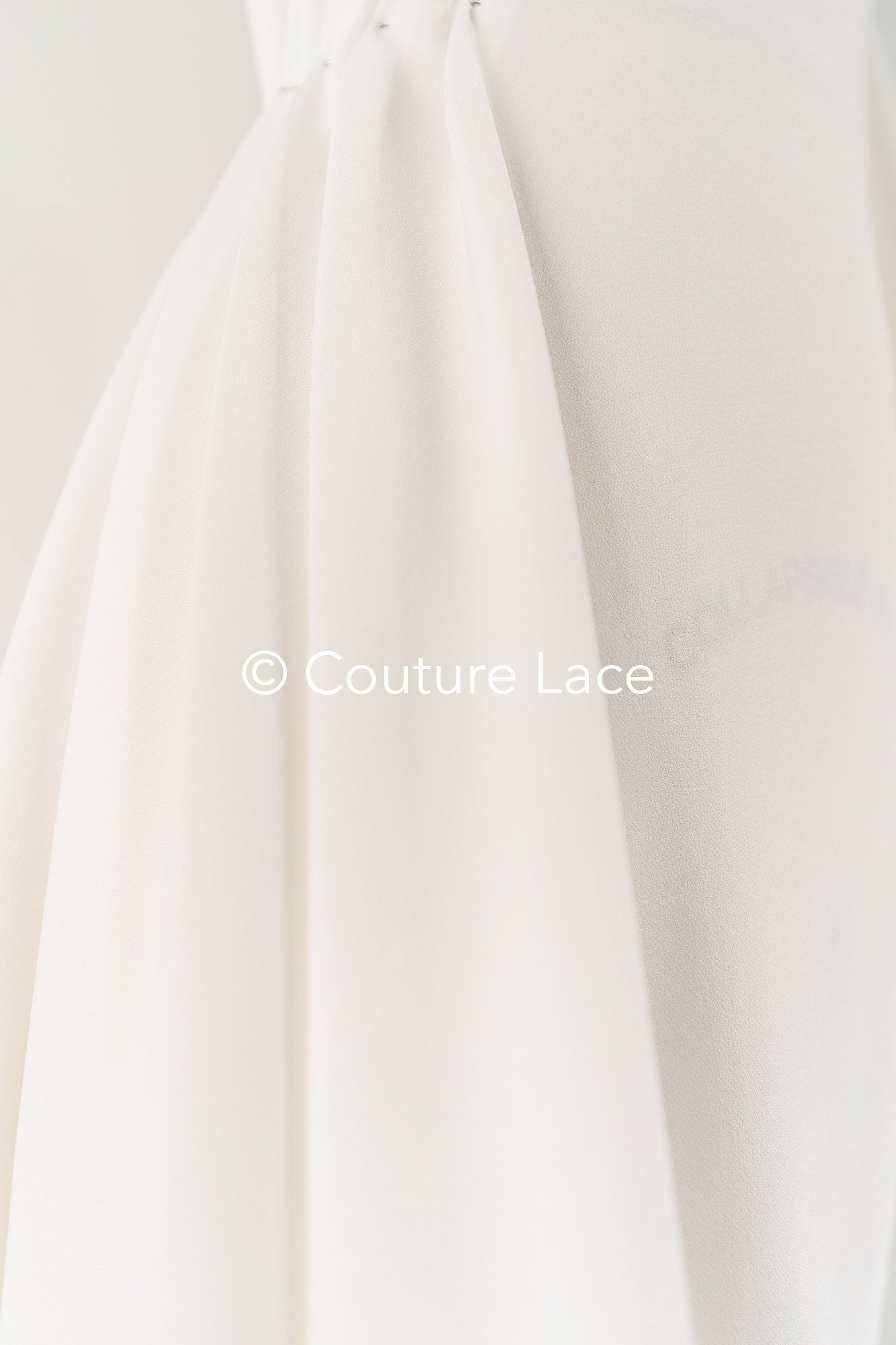 Heavy off-white stretch crepe fabric for wedding dresses – High-quality elastic fabric for creative wedding designs | Ideal for bridal wear & customization // R-195 (copy)