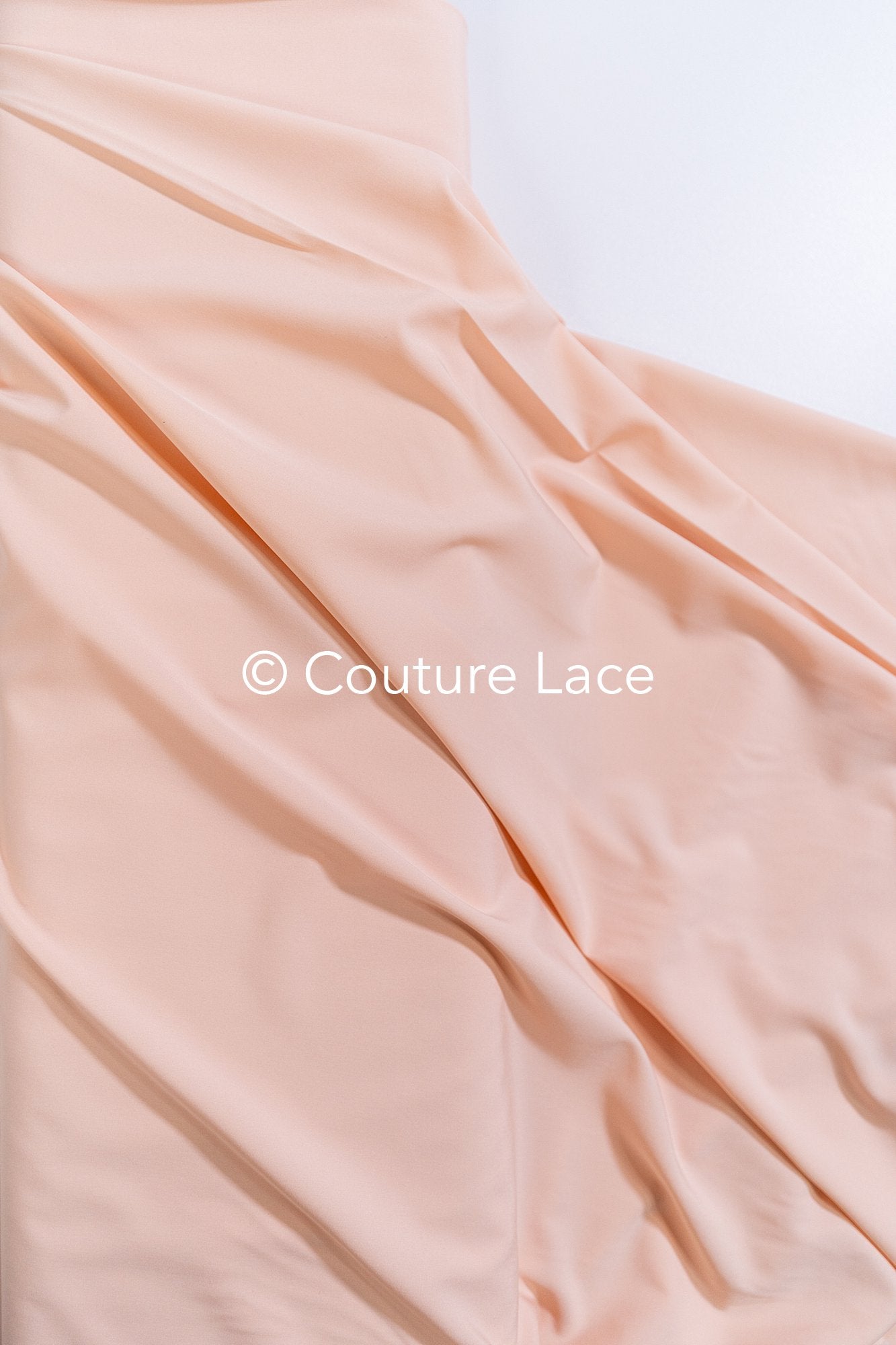 Peach-colored, soft stretch satin – ideal for elegant evening dresses and festive occasions // R-140-17