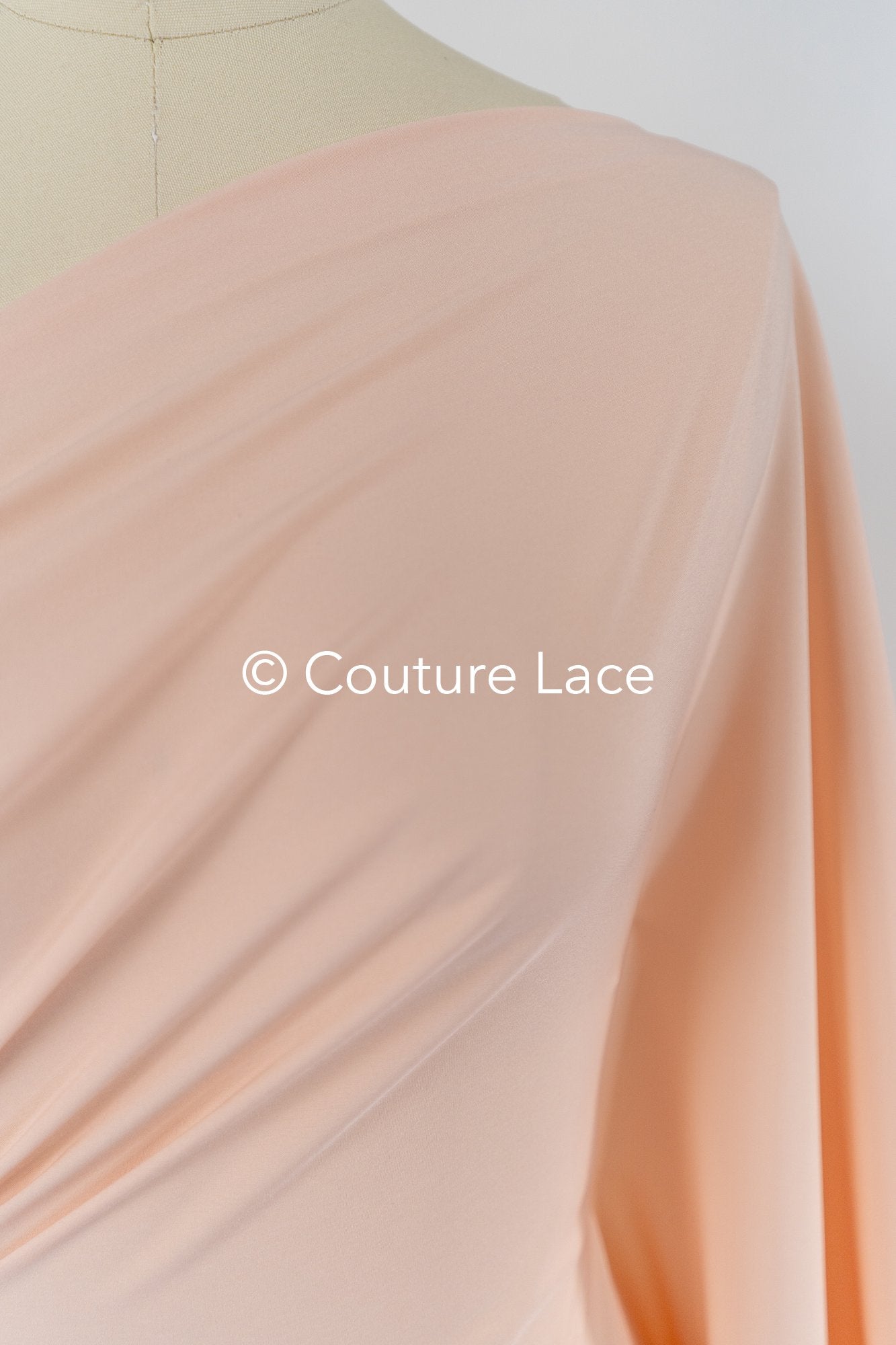 Peach-colored, soft stretch satin – ideal for elegant evening dresses and festive occasions // R-140-17