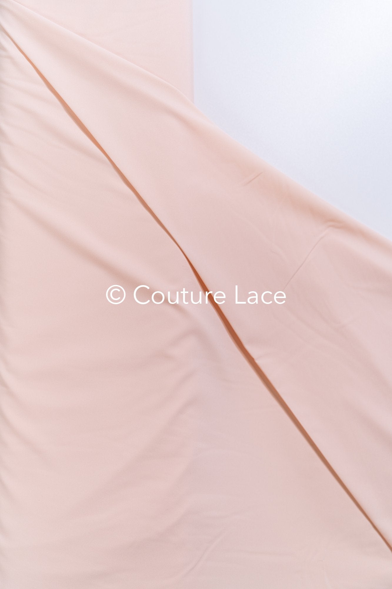 Bright Peach-colored, soft-rose colored stretch satin – ideal for elegant evening dresses and festive occasions // R-140-17