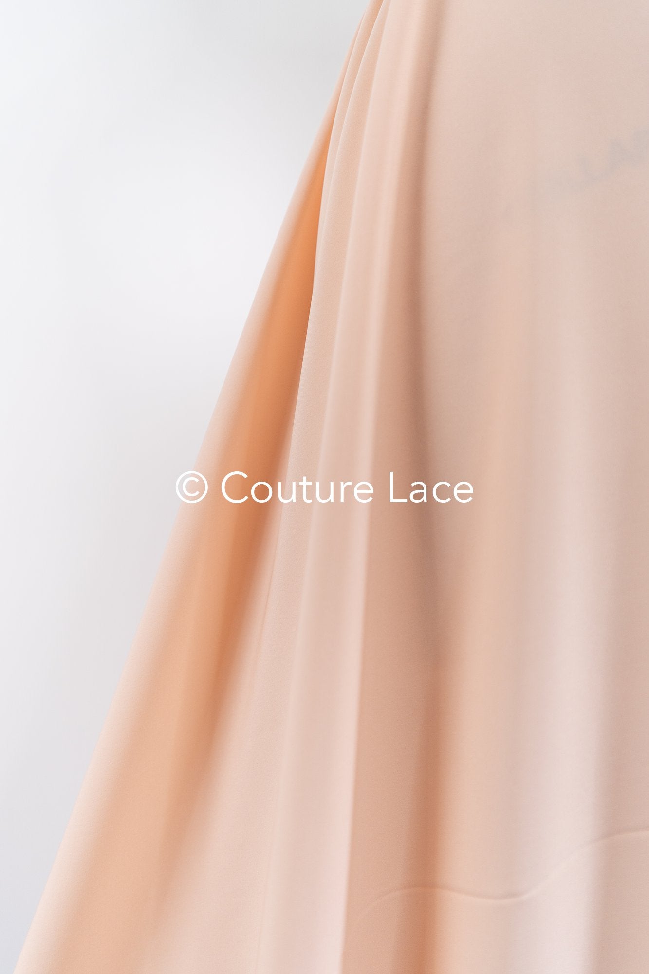 Peach-colored, soft stretch satin – ideal for elegant evening dresses and festive occasions // R-140-17